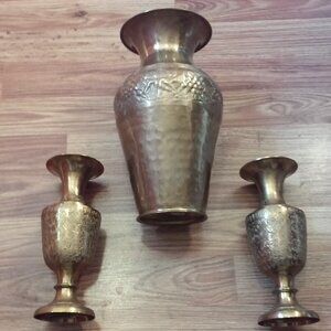 Three decorative brass vases with intricate designs. Large one is 10" Tall Small